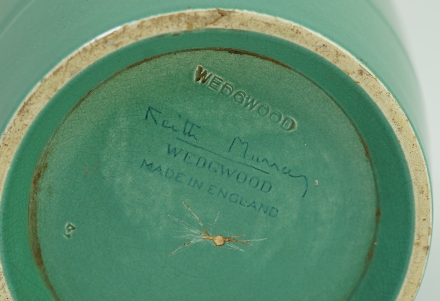 Keith Murray MC RDI FRIBA (New Zealand/British, 1892-1981) for Wedgwood: A matt green glazed tapering vase